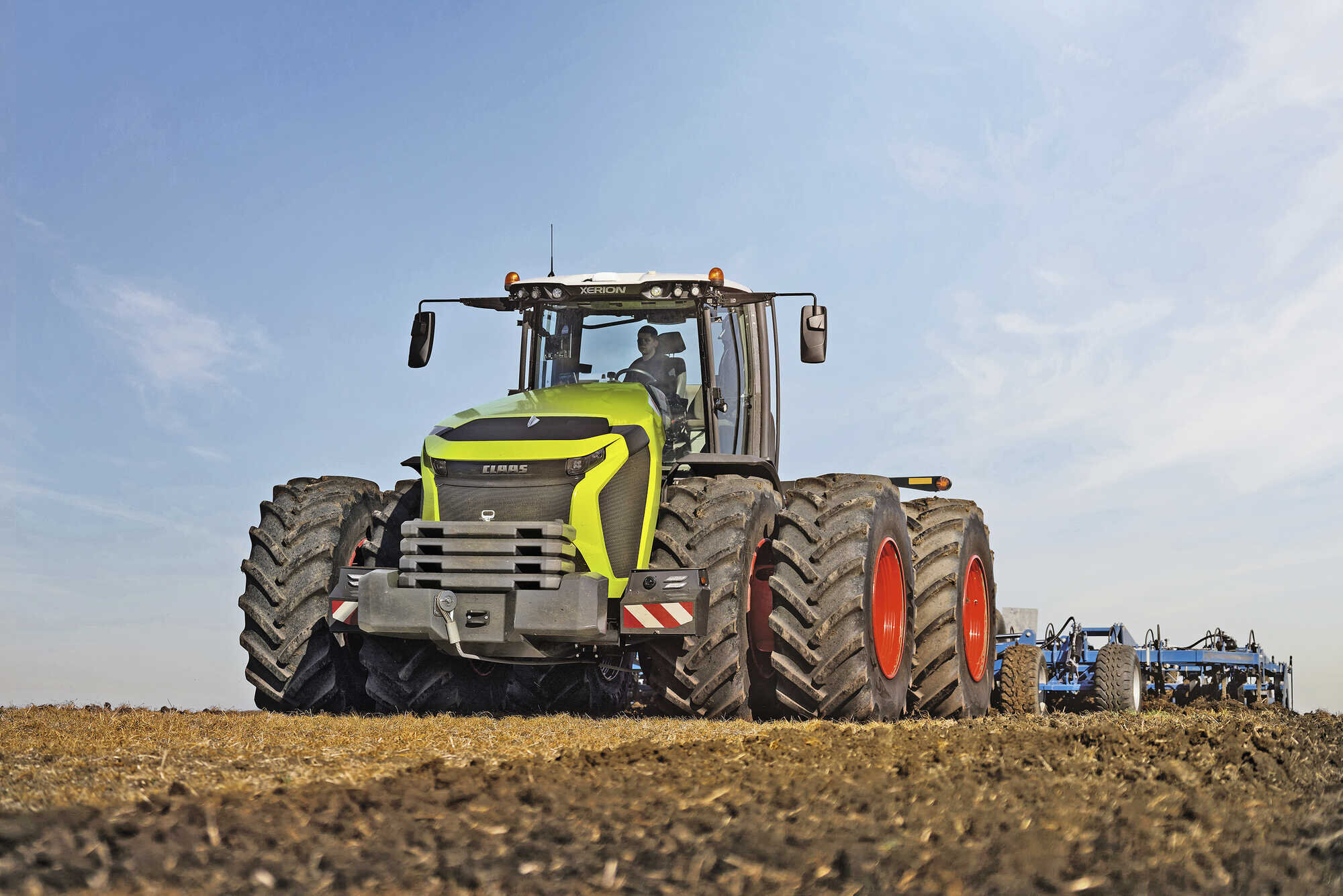 Claas Xxl Xerion Und Kleiner Sch Ttler Evion Agrarheute